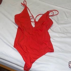 Red deep cut body suit